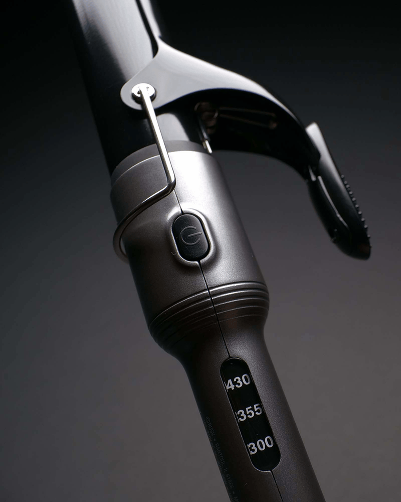 Plugged in sales spring curling iron